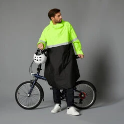 BTWIN FIETSPONCHO STAD ZICHTBAAR 'S NACHTS 560 ZWART/FLUOGEEL -Modekleding fietsponcho stad zichtbaar s nachts 560 zwartfluogeel 3