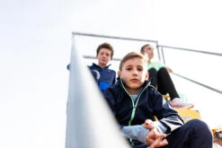 Warm Atletiekjack Voor Kinderen AT 500 -Modekleding warme en waterdichte jas voor hardlopen kinderen marineblauw groen 9